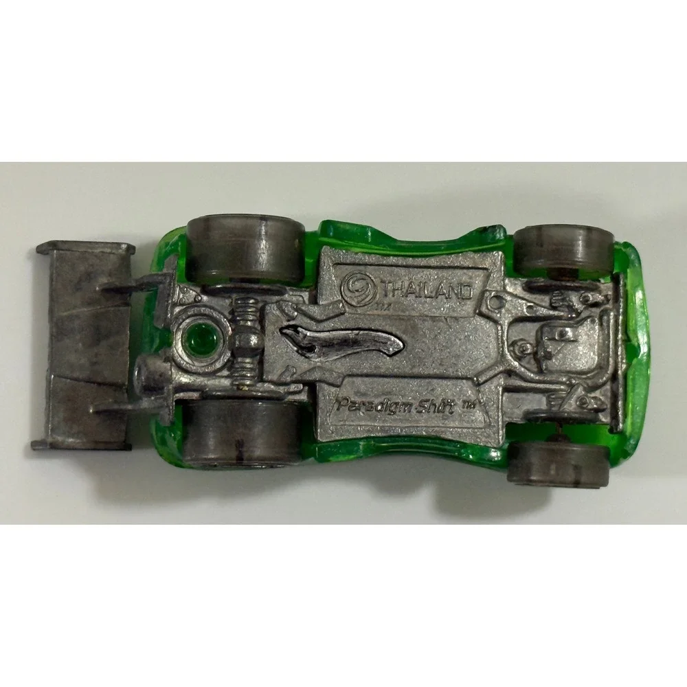Hot Wheels Paradigm Shift Kids 1:64 Green Translucent Diecast Race Car Spoiler